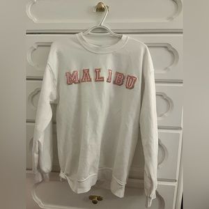 Pink and white Malibu sweatshirt from dear Hannah